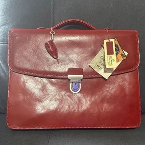 Brand New Tony Perotti. Briefcase  in Red color Single Compartment.100% Leather.